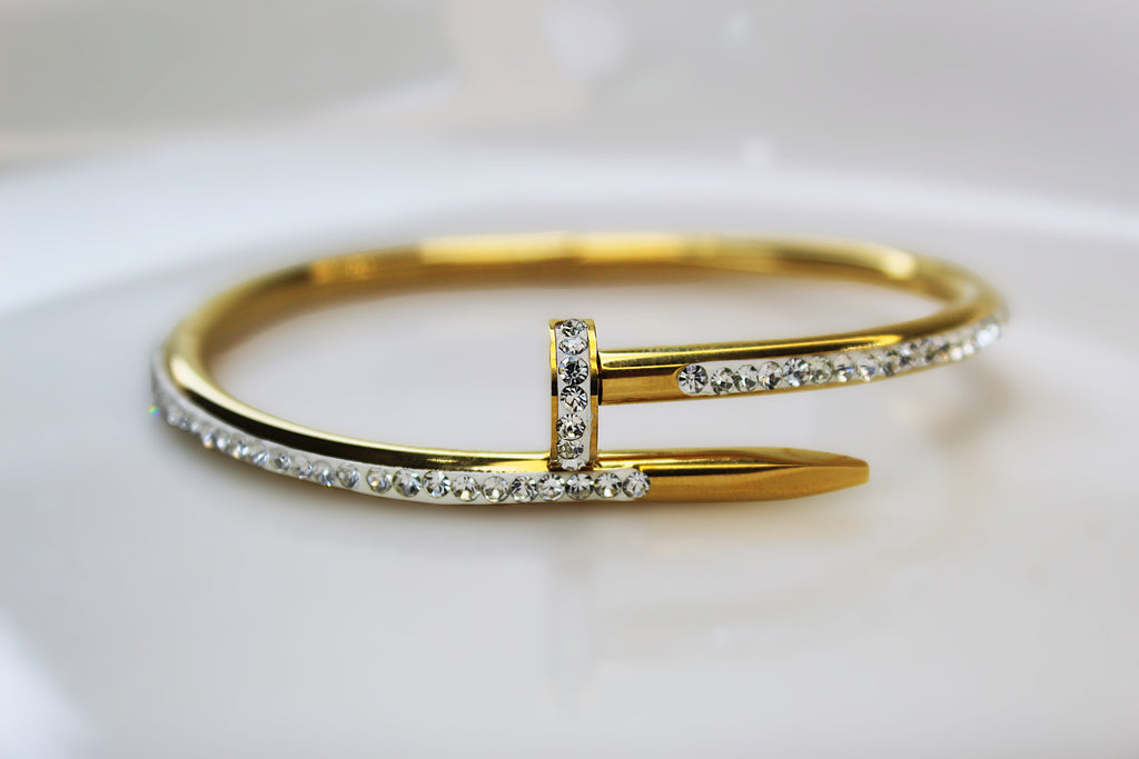 Luxury Golden Nail Bangle Stainless Steel Bracelet with 1 carat gold polish – Elegant Statement Jewelry